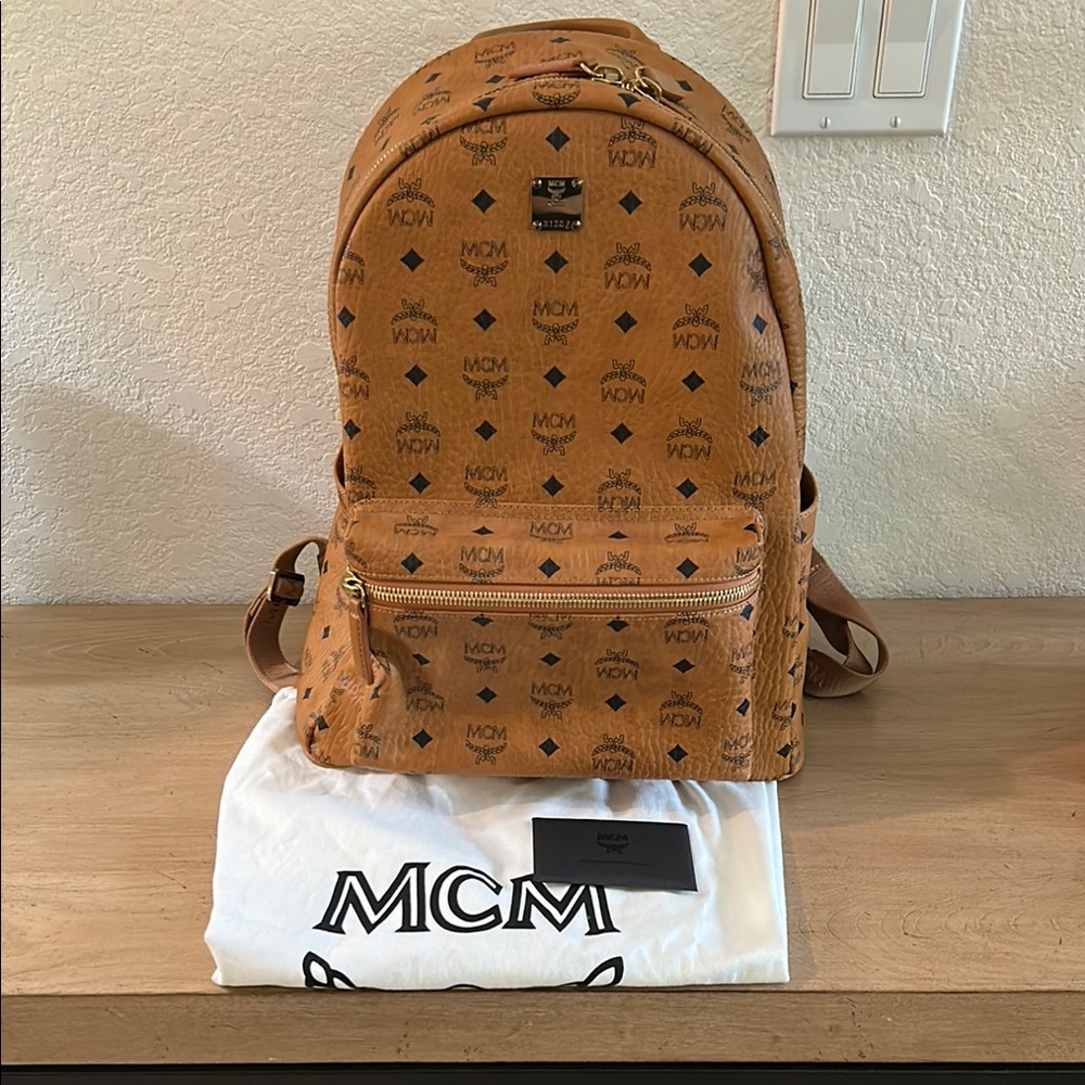 MCM Tan Backpack with Iconic Monogram and Studded Design